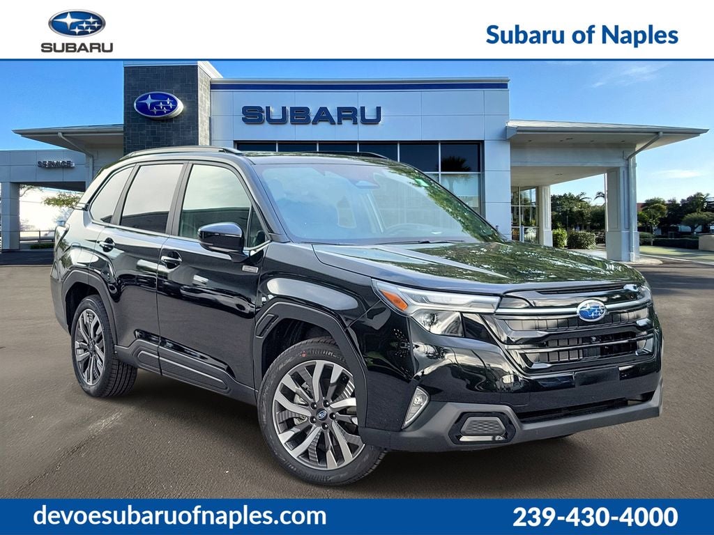 2026 Subaru FORESTER Touring Hybrid in Crystal Black Silica — front three-quarter view