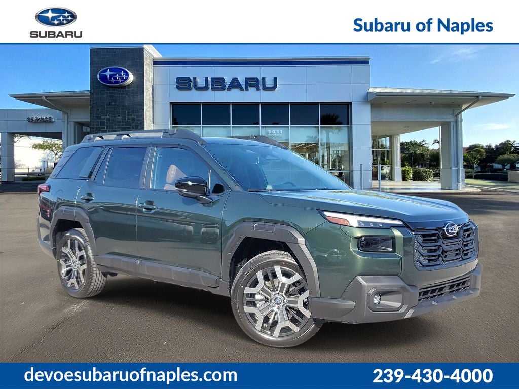 2026 Subaru OUTBACK Touring XT in Deep Emerald Green Pearl — front three-quarter view