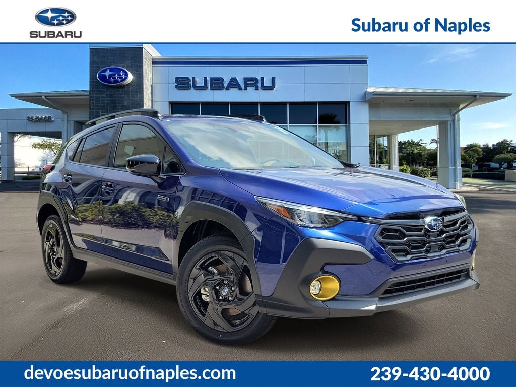 2026 Subaru CROSSTREK Sport Hybrid in Sapphire Blue Pearl — front three-quarter view