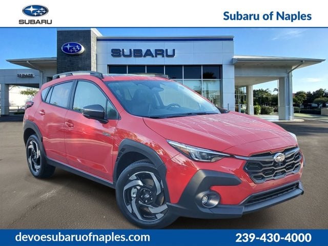 2026 Subaru CROSSTREK Limited Hybrid in Pure Red — front three-quarter view