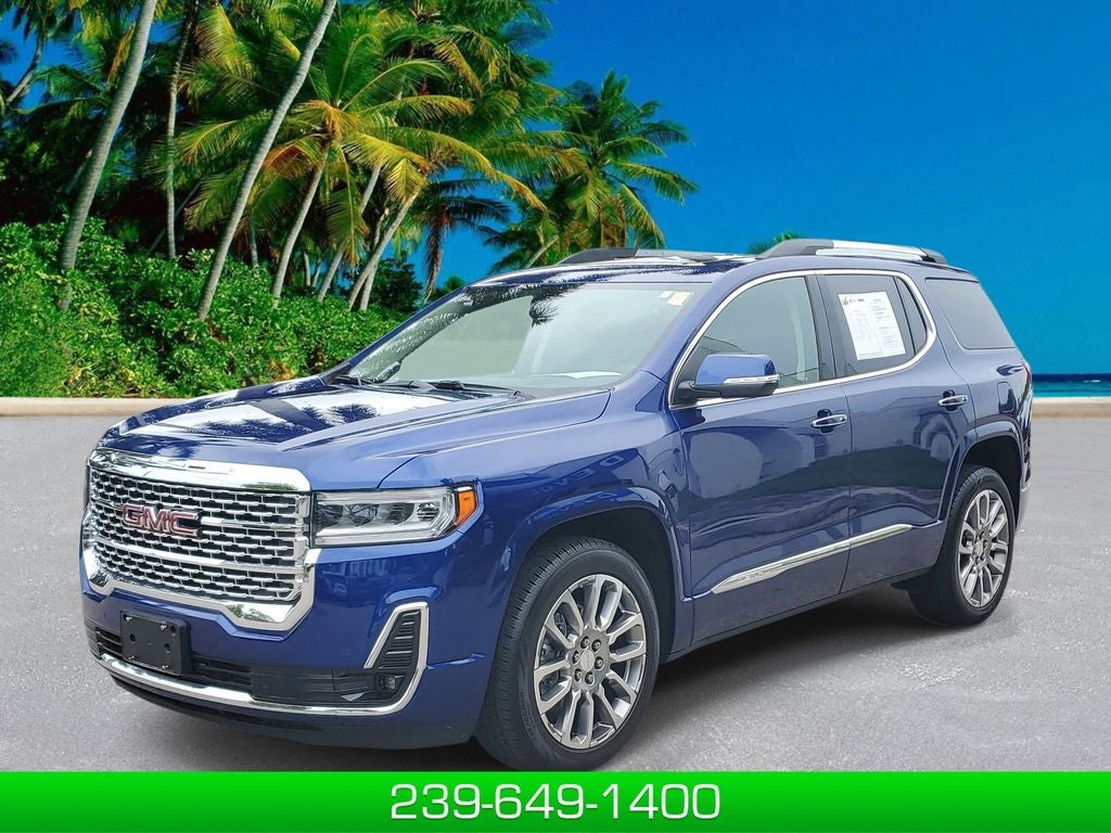 2023 GMC Acadia Denali in Ultra Blue Metallic — front three-quarter view