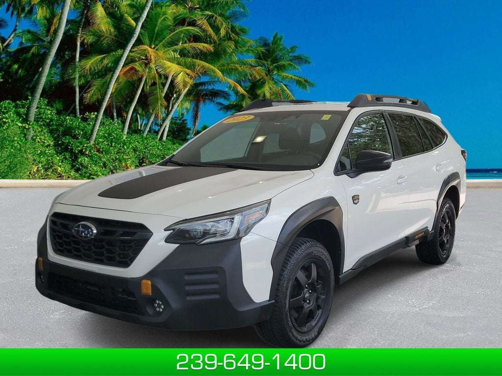 2023 Subaru Outback Wilderness in Crystal White Pearl — front three-quarter view